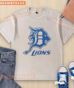 Alt Text: Premium Detroit Tigers and Detroit Lions logo washed t-shirt featuring a soft fabric and vibrant team colors.
