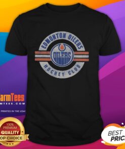 Premium Edmonton Oilers Surround T-Shirt featuring vibrant team colors and logo, perfect for fans and game day.
