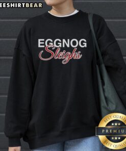 Cozy Premium Eggnog Sleighs Christmas Sweatshirt featuring festive design perfect for holiday celebrations.