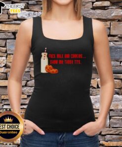 Model wearing a Premium Fck Milk And Cookies tank top, showcasing a fun graphic design in a vibrant setting.