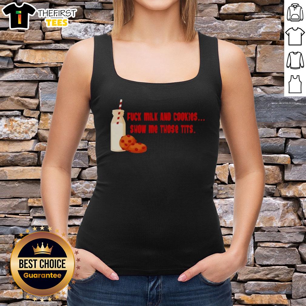 premium-fck-milk-and-cookies-show-my-those-tits-tank-top Model wearing a Premium Fck Milk And Cookies tank top, showcasing a fun graphic design in a vibrant setting.