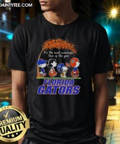 Alt Text: Premium Florida Gators X Peanuts Snoopy and Friends autumn t-shirt celebrating the joyous holiday season.