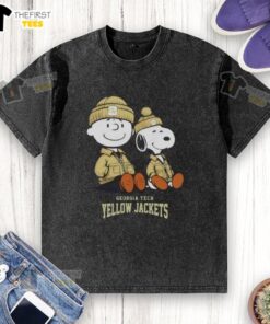 Alt Text: Premium Georgia Tech Yellow Jackets X Snoopy and Charlie Brown washed t-shirt featuring vibrant graphics and comfortable fit.