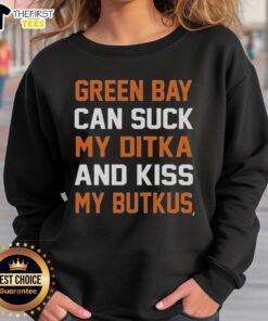 Alt Text: Premium Green Bay Can Suck My Ditka and Kiss My Butkus Sweatshirt featuring bold text on a cozy fabric background.