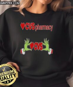 Premium Grinch Hands Love CVS Pharmacy Christmas Sweatshirt featuring festive design and cozy fit for holiday cheer.