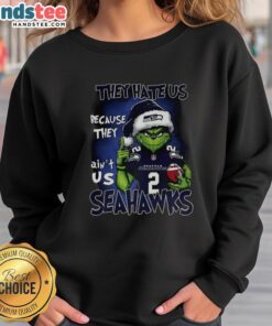 Alt Text: Premium Grinch Santa Hat sweatshirt featuring Seattle Seahawks NFL theme, perfect for festive fans celebrating Christmas.