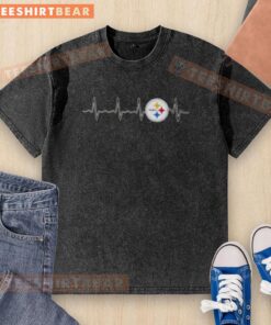 Premium Heartbeat Pittsburgh Steelers football logo graphic on a washed t-shirt, perfect for fans and casual wear.
