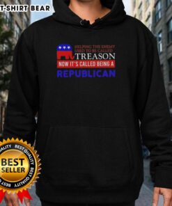 Premium hoodie featuring the phrase 'Helping the Enemy Used to Be Called Treason, Now It's Called Being a Republican.'
