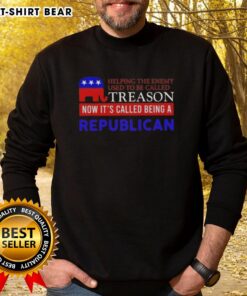 Premium sweatshirt with 'Helping the Enemy Used to be Called Treason, Now Its Called Being a Republican' slogan.