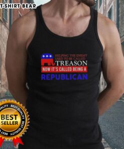 Premium tank top featuring the slogan 'Helping The Enemy Used To Be Called Treason, Now It's Called Being A Republican.'