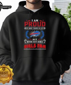 Buffalo Bills fan wearing a 'Proud of Many Things' hoodie, showcasing team spirit and pride in football culture.