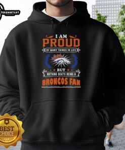 Premium 'I Am Proud Of Many Things In Life But Nothing Beats Being A Denver Broncos Fan' hoodie displayed on a hanger.
