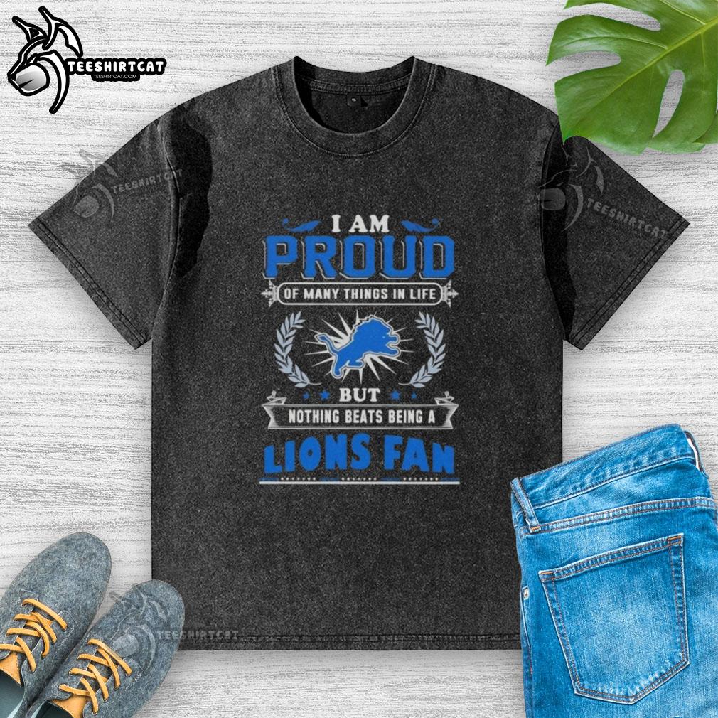 premium-i-am-proud-of-many-things-in-life-but-nothing-beats-being-a-detroit-lions-fan-washed-t-shirt Alt Text: Premium washed t-shirt featuring 'I Am Proud Of Many Things In Life, But Nothing Beats Being A Detroit Lions Fan.'