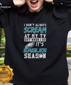 Premium Philadelphia Eagles season sweatshirt with playful slogan about TV reactions, perfect for fans and game day wear.