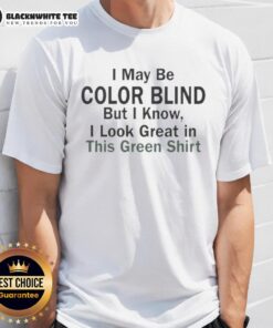 Man wearing a vibrant green t-shirt with the phrase 'I May Be Color Blind But I Know I Look Green' in bold text.