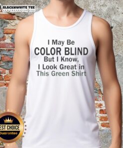 Man wearing a green tank top, confidently stating 'I may be color blind, but I know I look green' with a playful expression.