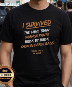 Alt Text: Premium I Survived The Lane Train T-Shirt featuring orange pants and cash in paper bags, perfect for fans.