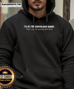 Man wearing a hoodie with the phrase Premium I'm All For Starving Poor People promoting social awareness and charity.