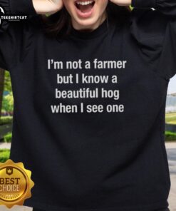 Premium sweatshirt featuring 'I'm Not A Farmer But I Know A Beautiful Hog When I See One' design for casual style.