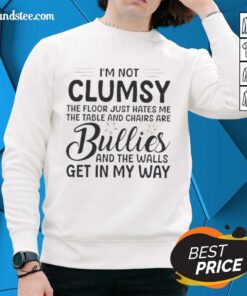 Premium sweatshirt with 'I'm Not Clumsy, The Floor Just Hates Me' design, featuring a cozy fit and stylish look.