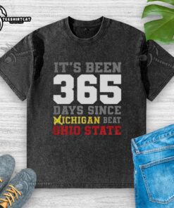 Premium washed t-shirt celebrating 356 days since Michigan beat Ohio State, featuring bold graphics and a comfortable fit.
