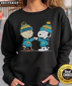Alt Text: Premium Jacksonville Jaguars Snoopy and Charlie Brown Best Friends Sweatshirt featuring vibrant graphics and cozy design.