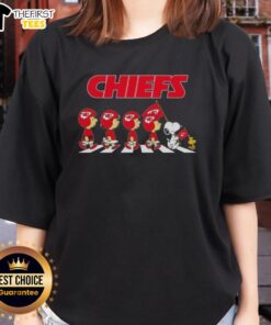 Premium Kansas City Chiefs X Peanuts Snoopy and Friends Abbey Road Ladies Tee featuring iconic characters and team spirit.