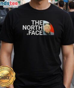 Alt Text: Premium Kim Jong-Un The North Face T-Shirt featuring a unique design, perfect for fans of political fashion and streetwear.