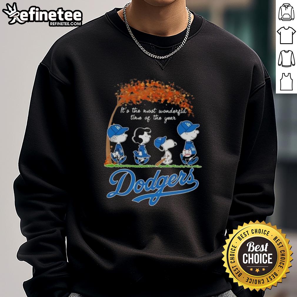 premium-los-angeles-dodgers-x-peanuts-snoopy-and-friends-autumn-its-the-most-wonderful-time-of-the-year-sweatshirt Premium Los Angeles Dodgers X Peanuts Snoopy sweatshirt for autumn, celebrating the most wonderful time of the year.