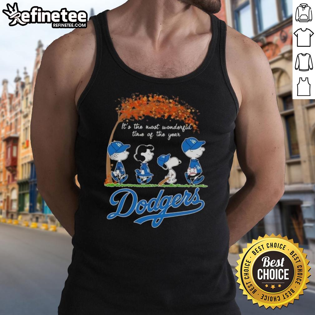 premium-los-angeles-dodgers-x-peanuts-snoopy-and-friends-autumn-its-the-most-wonderful-time-of-the-year-tank-top Alt Text: Premium Los Angeles Dodgers X Peanuts Snoopy tank top featuring autumn design, perfect for the most wonderful time of the year.