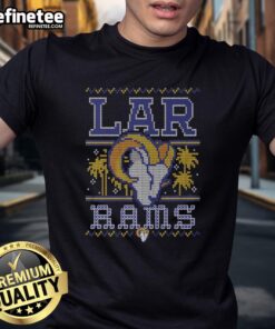 Alt Text: Premium Los Angeles Rams Holiday T-Shirt featuring festive graphics and team colors for the ultimate fan celebration.