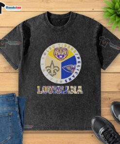 Premium Louisiana City Sports washed t-shirt featuring LSU Tigers, Pelicans, and Saints logo for fans.