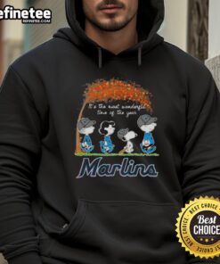 Alt Text: Premium Miami Marlins X Peanuts Snoopy and Friends hoodie featuring autumn design, perfect for the holiday season.