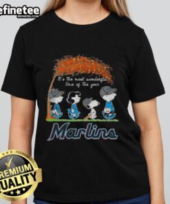 Alt Text: Premium Miami Marlins X Peanuts Snoopy and Friends autumn ladies tee featuring festive holiday design.