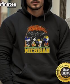Premium Michigan Wolverines X Peanuts Snoopy hoodie for autumn, celebrating 'It's The Most Wonderful Time Of The Year'.
