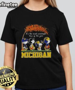 Premium Michigan Wolverines X Peanuts Snoopy and Friends autumn ladies tee celebrating the most wonderful time of the year.