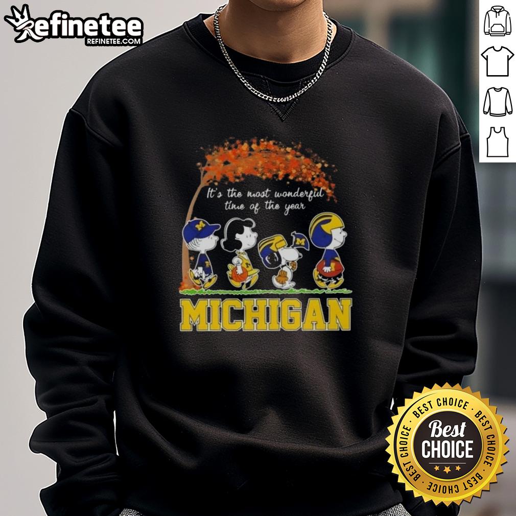 premium-michigan-wolverines-x-peanuts-snoopy-and-friends-autumn-its-the-most-wonderful-time-of-the-year-sweatshirt Premium Michigan Wolverines X Peanuts Snoopy and Friends sweatshirt for autumn, celebrating the most wonderful time of the year.