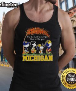 Alt Text: Premium Michigan Wolverines tank top featuring Snoopy and friends celebrating autumn and the joy of the season.