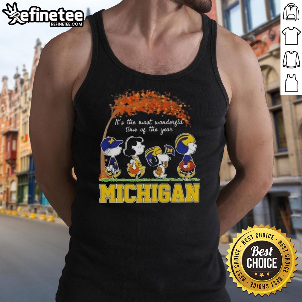 premium-michigan-wolverines-x-peanuts-snoopy-and-friends-autumn-its-the-most-wonderful-time-of-the-year-tank-top Alt Text: Premium Michigan Wolverines tank top featuring Snoopy and friends celebrating autumn and the joy of the season.