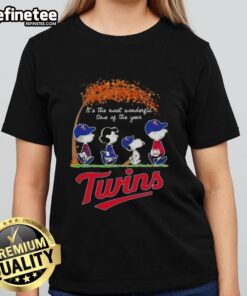 Premium Minnesota Twins X Peanuts tee featuring Snoopy and friends celebrating autumn, perfect for the season.