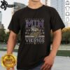 Premium Minnesota Vikings Holiday T-Shirt featuring festive colors and team logo, perfect for holiday cheer and game day.