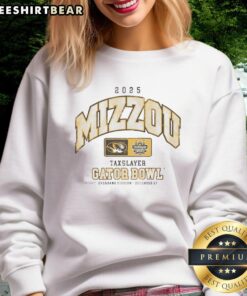 Alt Text: Premium Missouri Tigers 2025 TaxSlayer Gator Bowl sweatshirt featuring team logo and vibrant colors for fans.