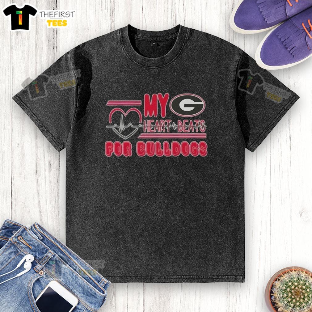 premium-my-heart-beats-for-georgia-bulldogs-football-washed-t-shirt Alt Text: Premium My Heart Beats For Georgia Bulldogs Football washed t-shirt featuring vibrant team colors and logo design.