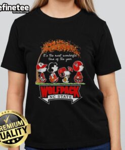 Premium NC State Wolfpack X Peanuts Snoopy and Friends Autumn tee for women, celebrating the most wonderful time of the year.