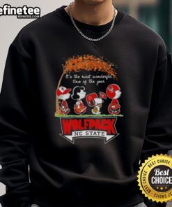 Premium NC State Wolfpack X Peanuts Snoopy sweatshirt for autumn, celebrating the most wonderful time of the year.