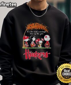 Alt Text: Premium Nebraska Cornhuskers X Peanuts Snoopy sweatshirt for autumn, celebrating 'It's the Most Wonderful Time of the Year.'
