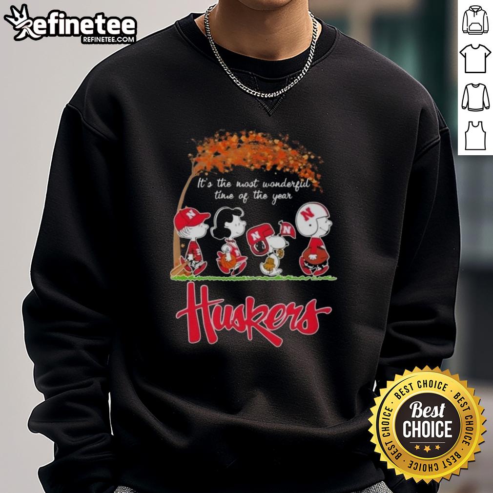 premium-nebraska-cornhuskers-x-peanuts-snoopy-and-friends-autumn-its-the-most-wonderful-time-of-the-year-sweatshirt Alt Text: Premium Nebraska Cornhuskers X Peanuts Snoopy sweatshirt for autumn, celebrating 'It's the Most Wonderful Time of the Year.'