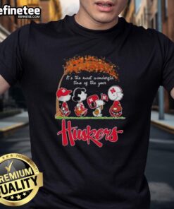 Alt Text: Premium Nebraska Cornhuskers X Peanuts Snoopy and Friends autumn t-shirt celebrating the season's joy and spirit.