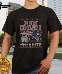 Alt Text: Premium New England Patriots holiday t-shirt featuring team colors and festive design, perfect for fans celebrating the season.