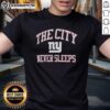 Premium New York Giants Nike The City Never Sleeps T-Shirt in blue, featuring logo and vibrant city skyline design.